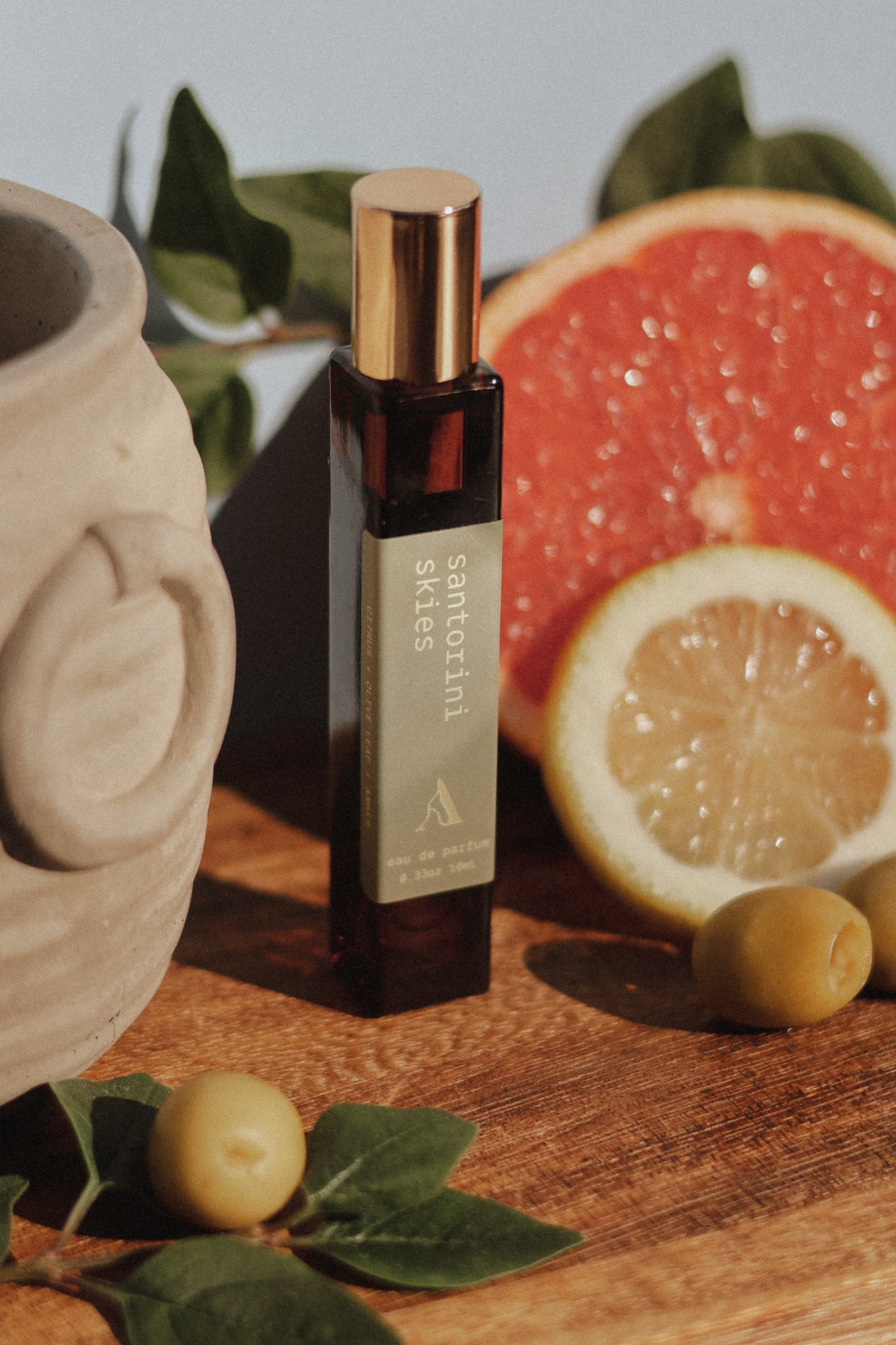 santorini skies | citrus + olive leaf + amber