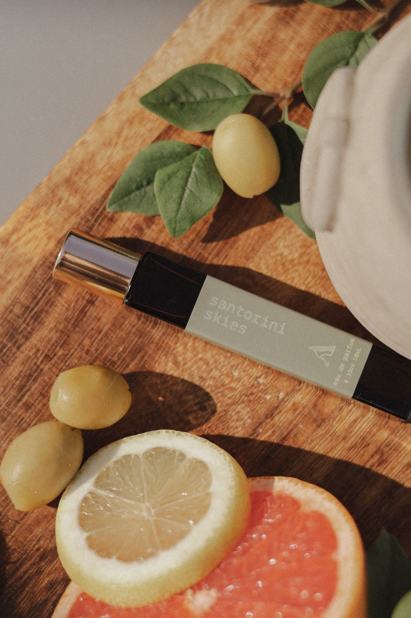 santorini skies | citrus + olive leaf + amber